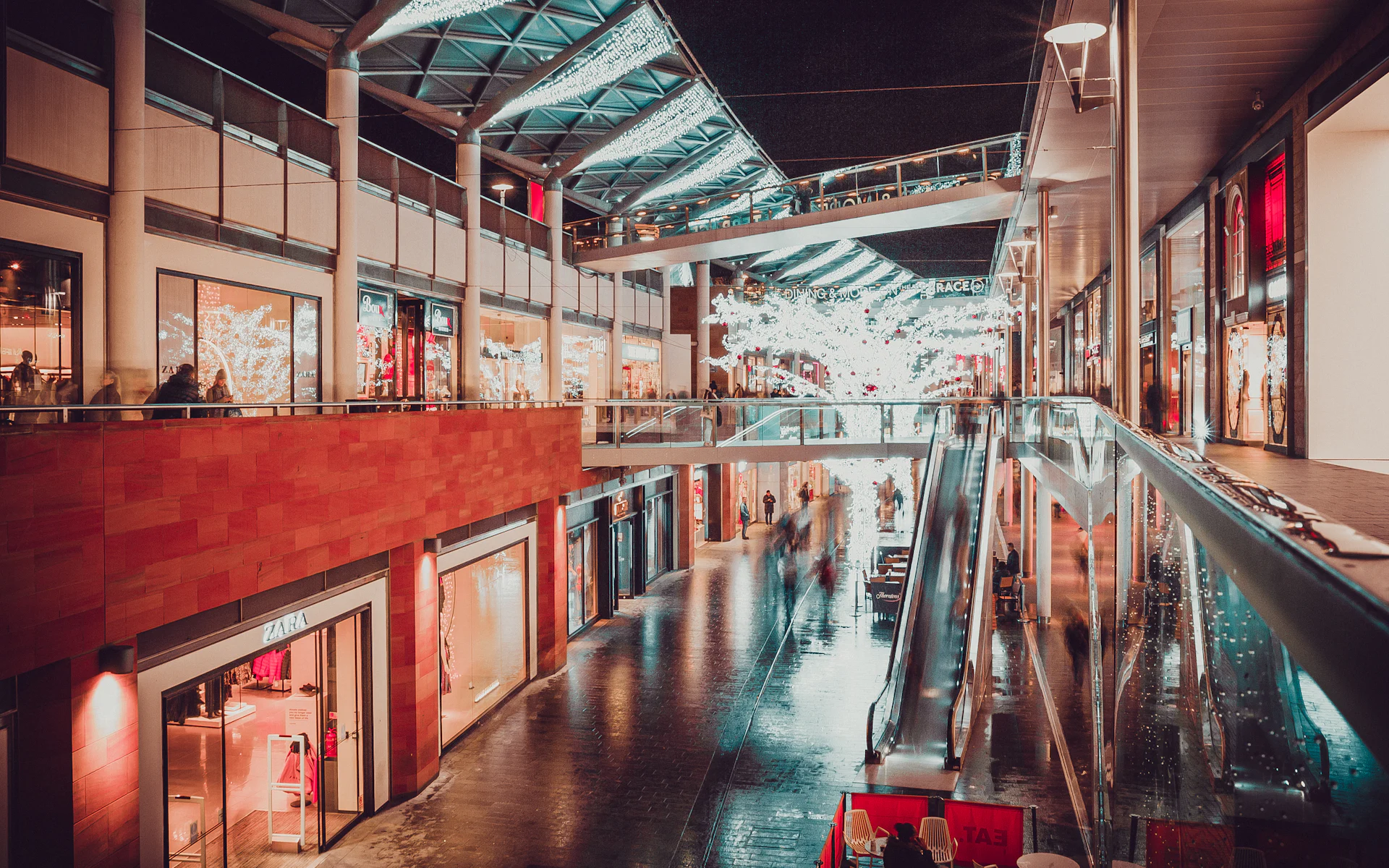 Modern shopping gallery with escalators